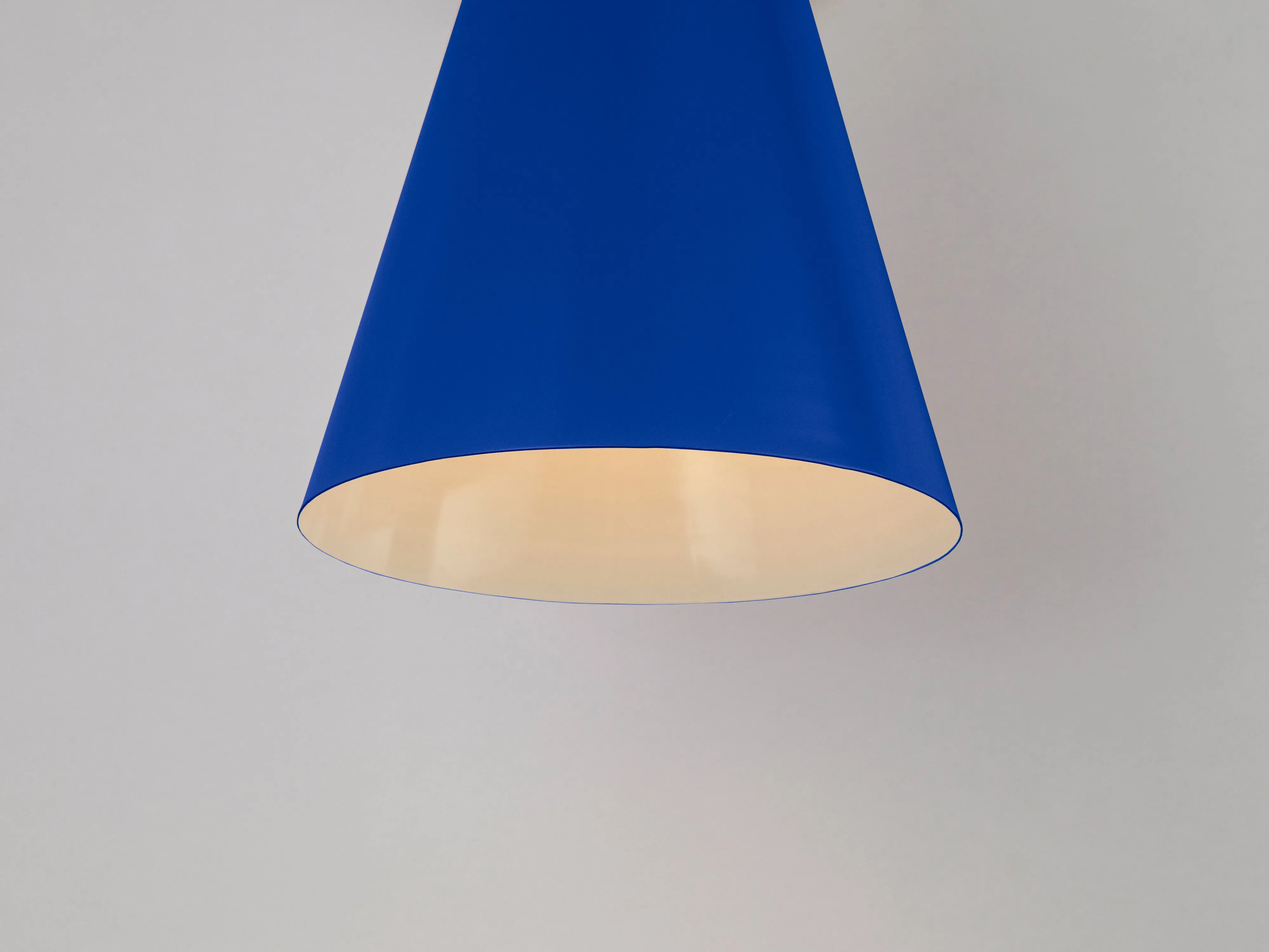 Blue cone shade wall light