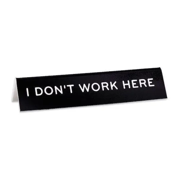 I Don't Work Here Desk Sign by The Found